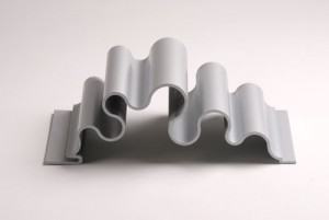 curvy silver dimensional metal panel