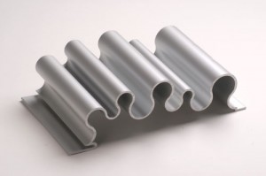 curvy silver dimensional metal panel